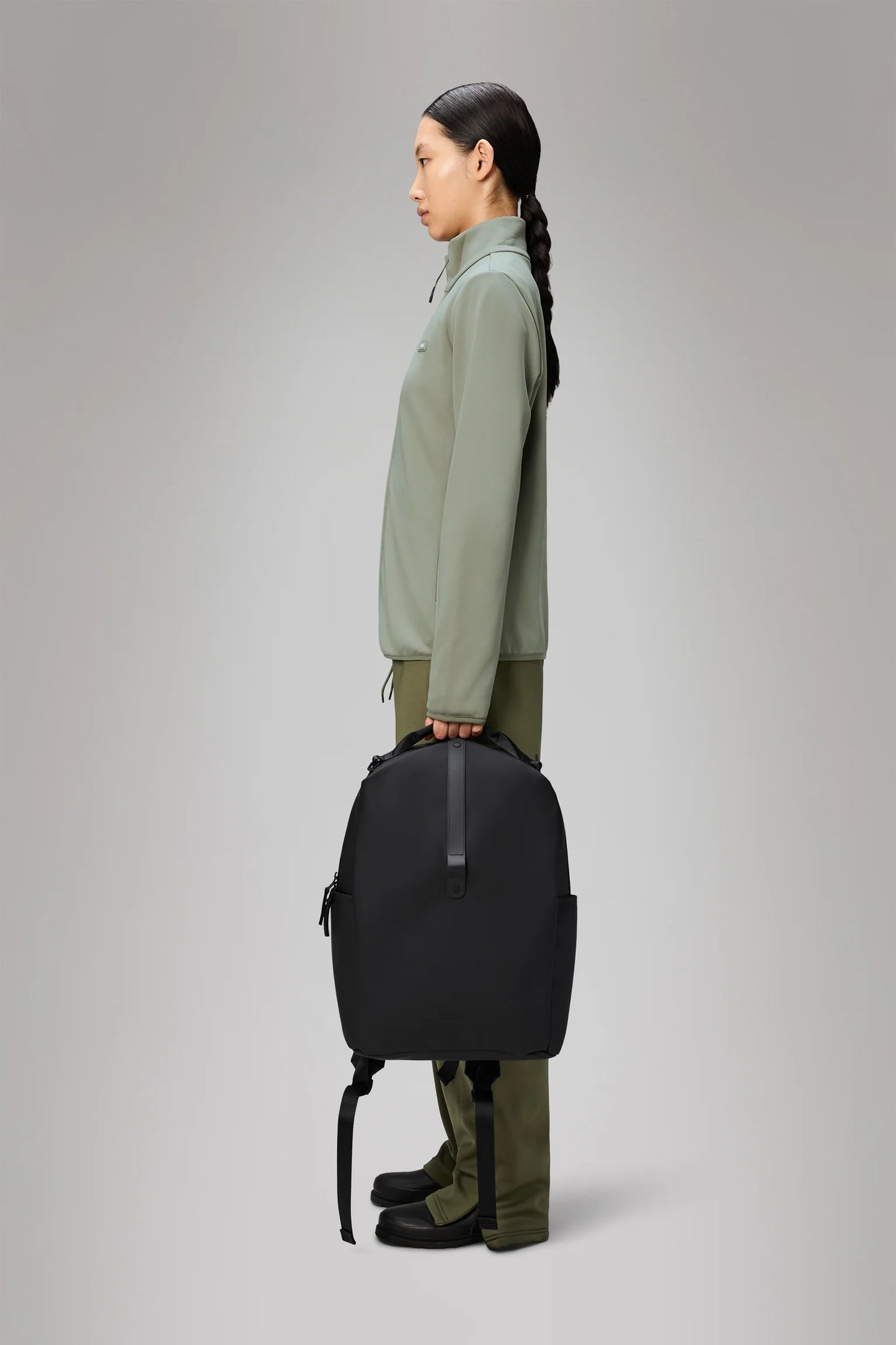 RAINS Clip Front Backpack